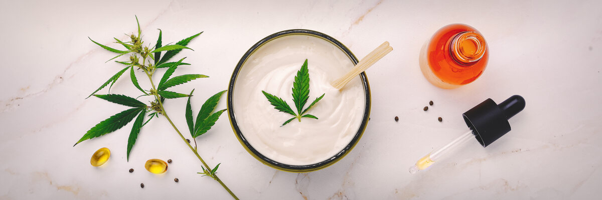 Cannabis cream with leaves around it